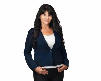 kim rideout in a blue suit jacket with white shirt