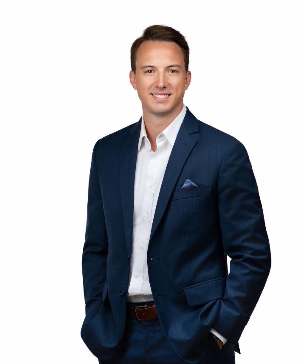 Coby blystone in a suit